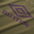 BUTTER GOODS x UMBRO Diamond Logo Raglan Tee Army/Eggplant