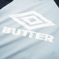 BUTTER GOODS x UMBRO Diamond Logo Raglan Tee Slate/Navy